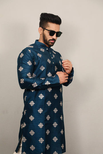 PEACOCK BLUE E BUTTI MOTIF SUQUNCE EMBRODERED KURTA WITH PAJAMA