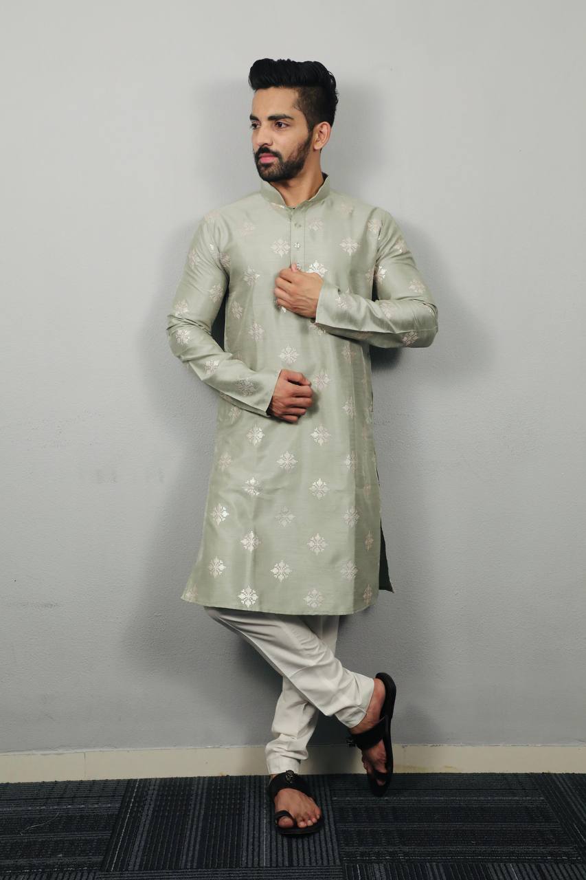 PISTA  BUTTI  MOTIF SUQUNCE EMBRODERED KURTA WITH PAJAMA